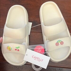 Capelli of New York Kids Cream Slide Sandals with Fun Embellishments